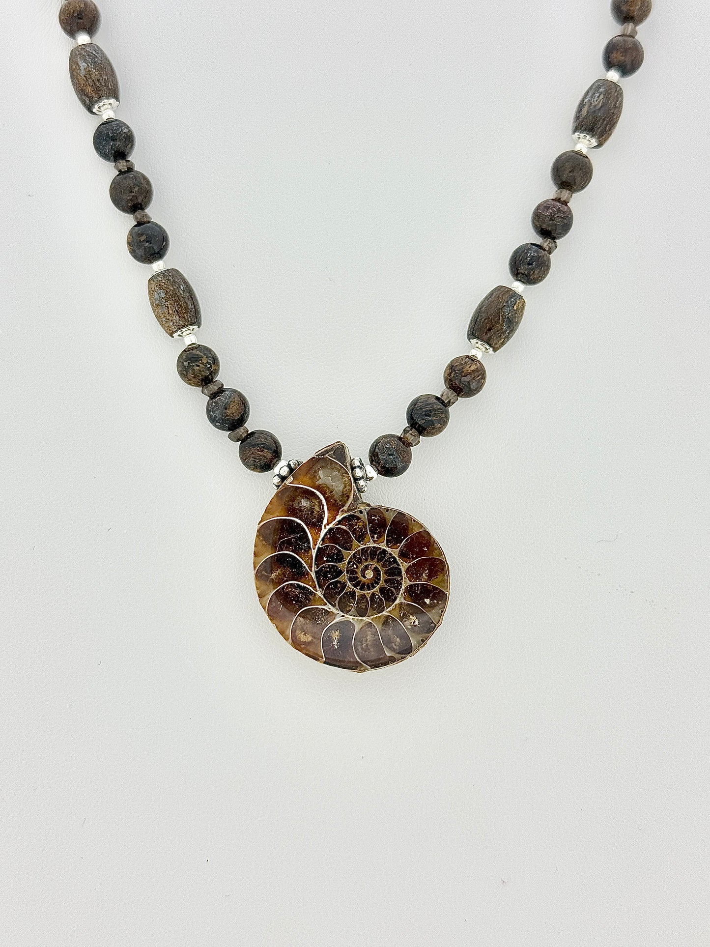 Fossil Ammonite, Bronzite, And Smokey Quartz Necklace
