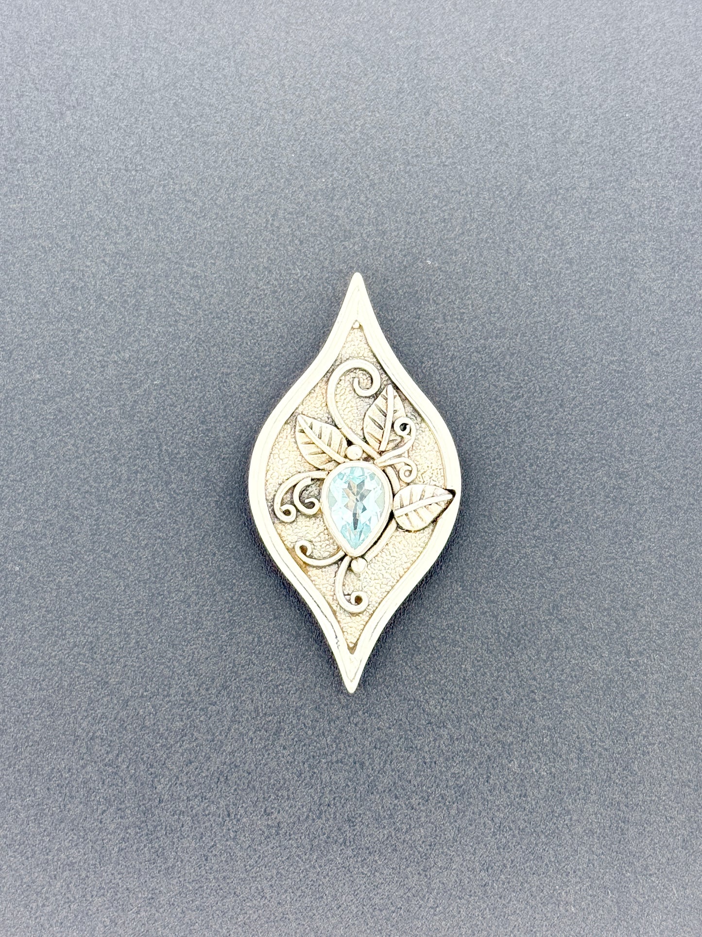 Blue Topaz Pendant with Faceted Stone