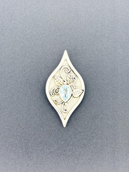 Blue Topaz Pendant with Faceted Stone